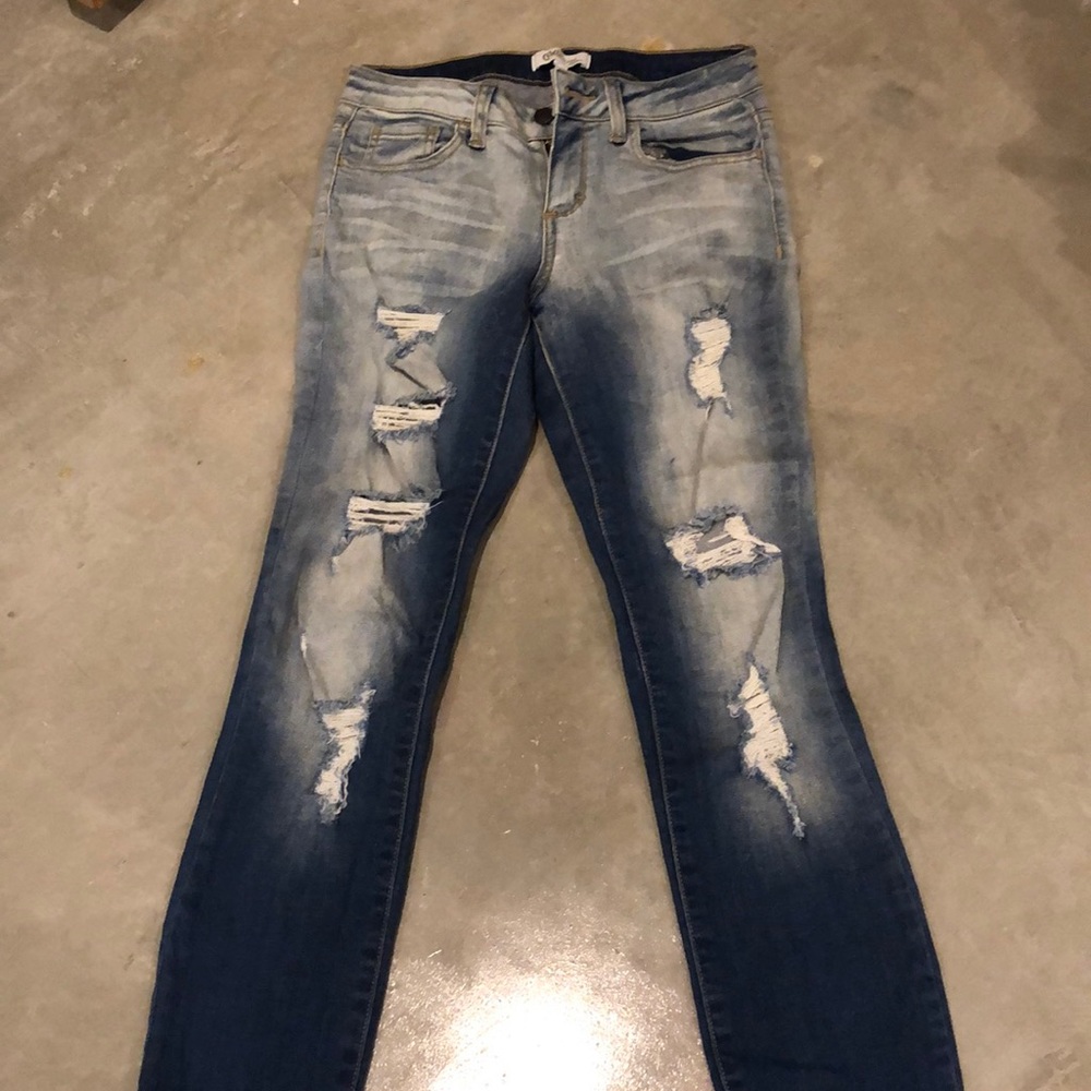 Distressed denim skinny jeans